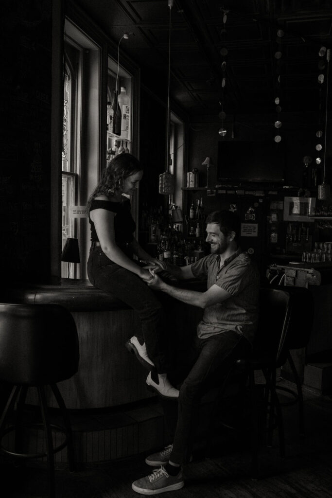 An edgy engagement session at a dive bar in Seattle, Washington photographed by Wilder Photography