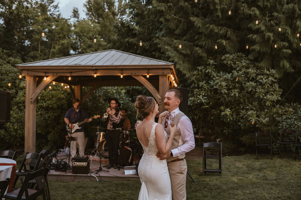 An intimate backyard wedding reception overlooking the Puget Sound in Tacoma, Washington