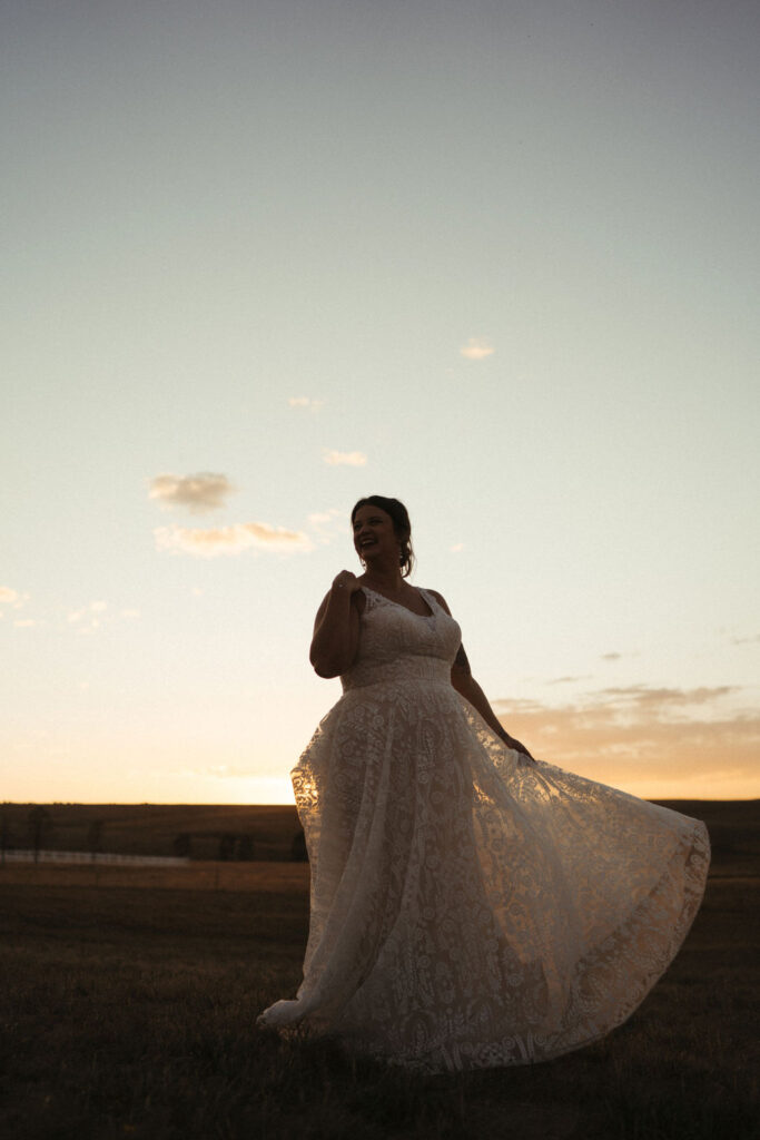 Magical Colorado sunset bridal portraits at Flying Horse Ranch photographed by Wilder Photography