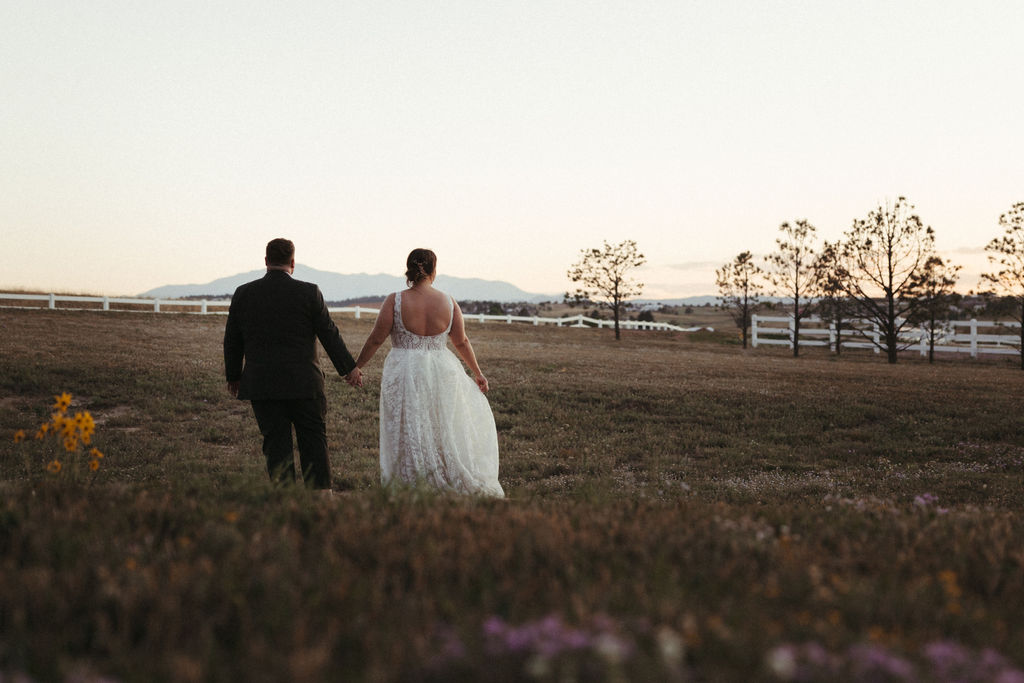 Magical Colorado sunset bridal portraits at Flying Horse Ranch photographed by Wilder Photography