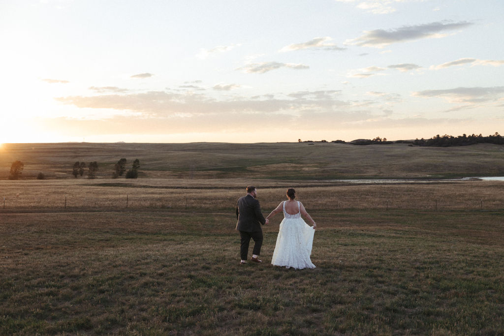 Magical Colorado sunset bridal portraits at Flying Horse Ranch photographed by Wilder Photography